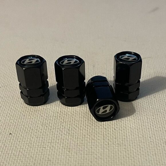 Hyundai valve Stem caps in Black set of 4 NWT - Picture 2 of 4